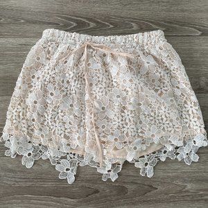 cream floral applique shorts